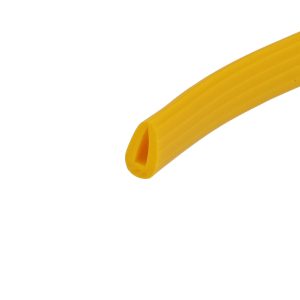 Close-up of a yellow, ribbed plastic strap or loop bending diagonally across the image.