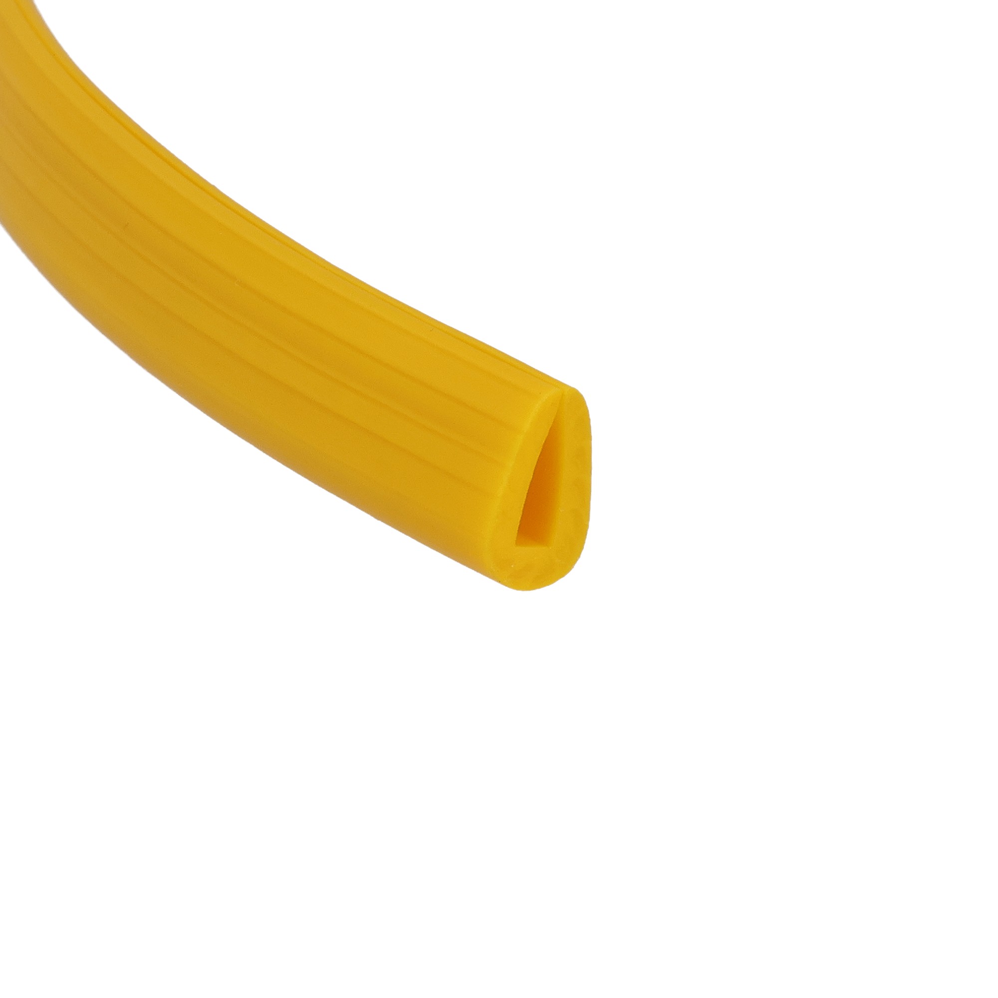 12-311-09_3102 - Centrum uszczelek Close-up of a curved yellow plastic piece with a ridged surface, set against a white background.