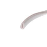 Close-up of a white ceramic plate with a pale pink rim along the curved edge.