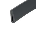 Close-up of a black, rounded rectangular bar with a chipped corner at the bottom edge.
