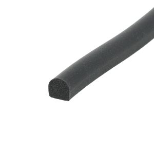 Close-up of a black cylindrical foam rod with a rounded end against a white background.