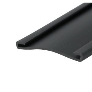 Close-up of a black metal rectangular hollow extrusion with a diagonal edge along a white backdrop.