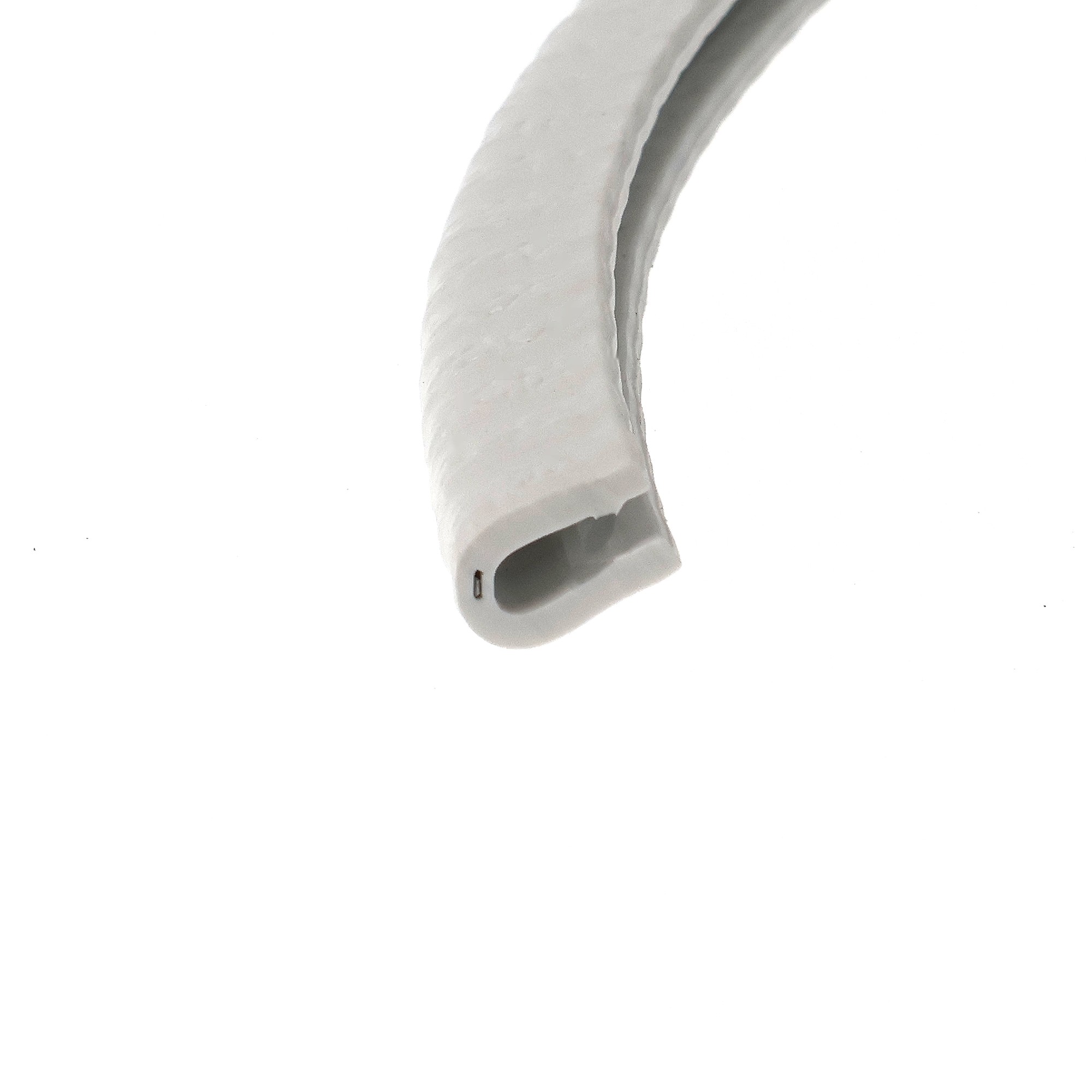 oslona-krawedziowa-samozaciskowa-pvc-1-x-56-x-85-mm-bialo-szara-54-004-3 - Centrum uszczelek Close-up of a white USB-C style cable end with a small metal connector visible against a white background.