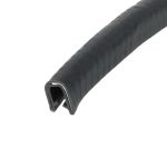 Close-up of a black cylindrical tube with a square hollow opening at the end.