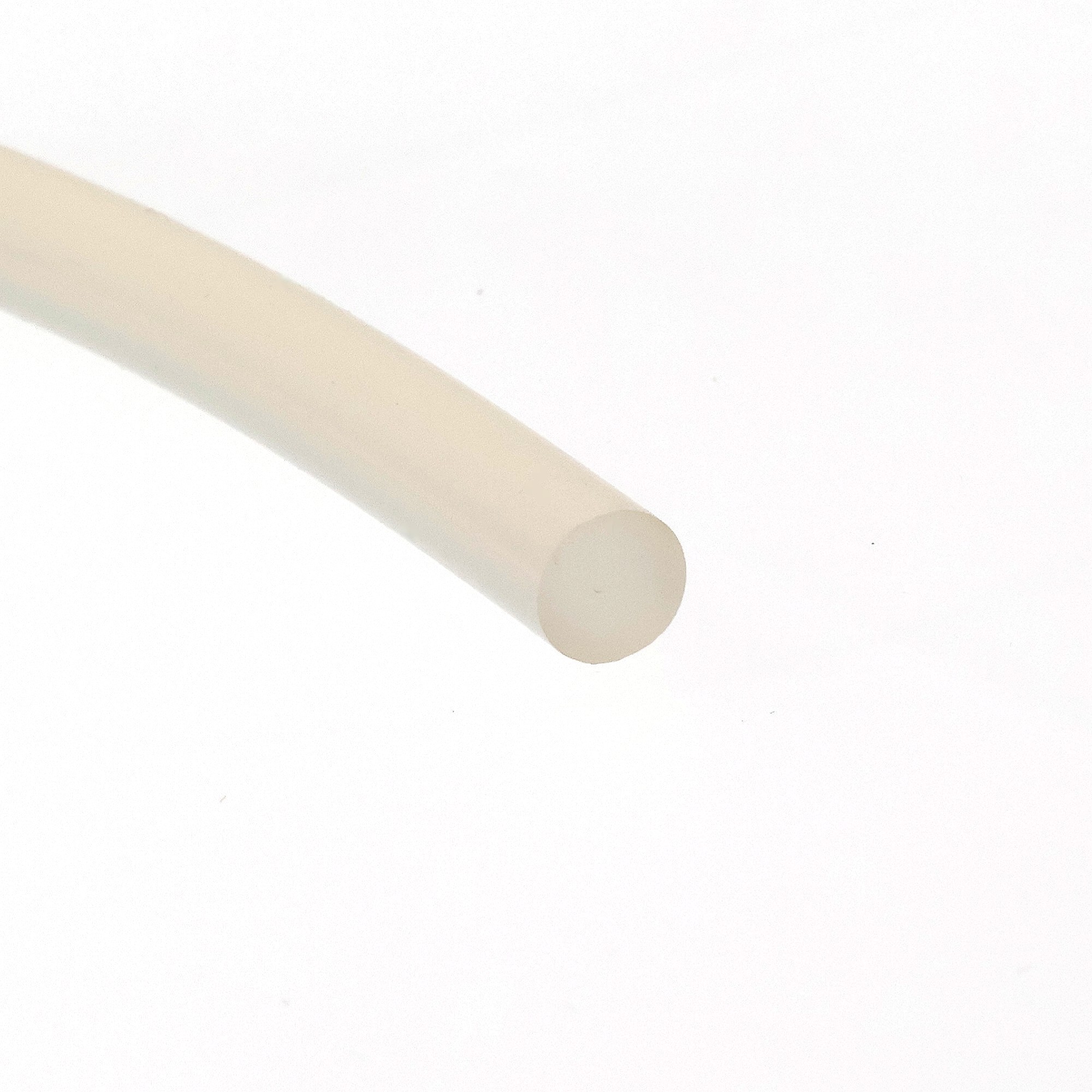 sznur-silikonowy-lity-fi-15mm-bezbarwny-023015-1 1 - Centrum uszczelek Beige cylindrical object diagonally across a white background, with rounded ends, occupying the left-to-right space.