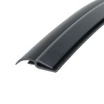 Close-up of a black rubber weatherstrip/gasket with curved, dual-channel cross-section photographed diagonally.