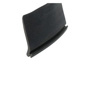 Close-up of a black curved plastic edge with a shallow groove along its length