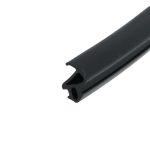 Close-up of a black metal rail with a curved notch at the end.