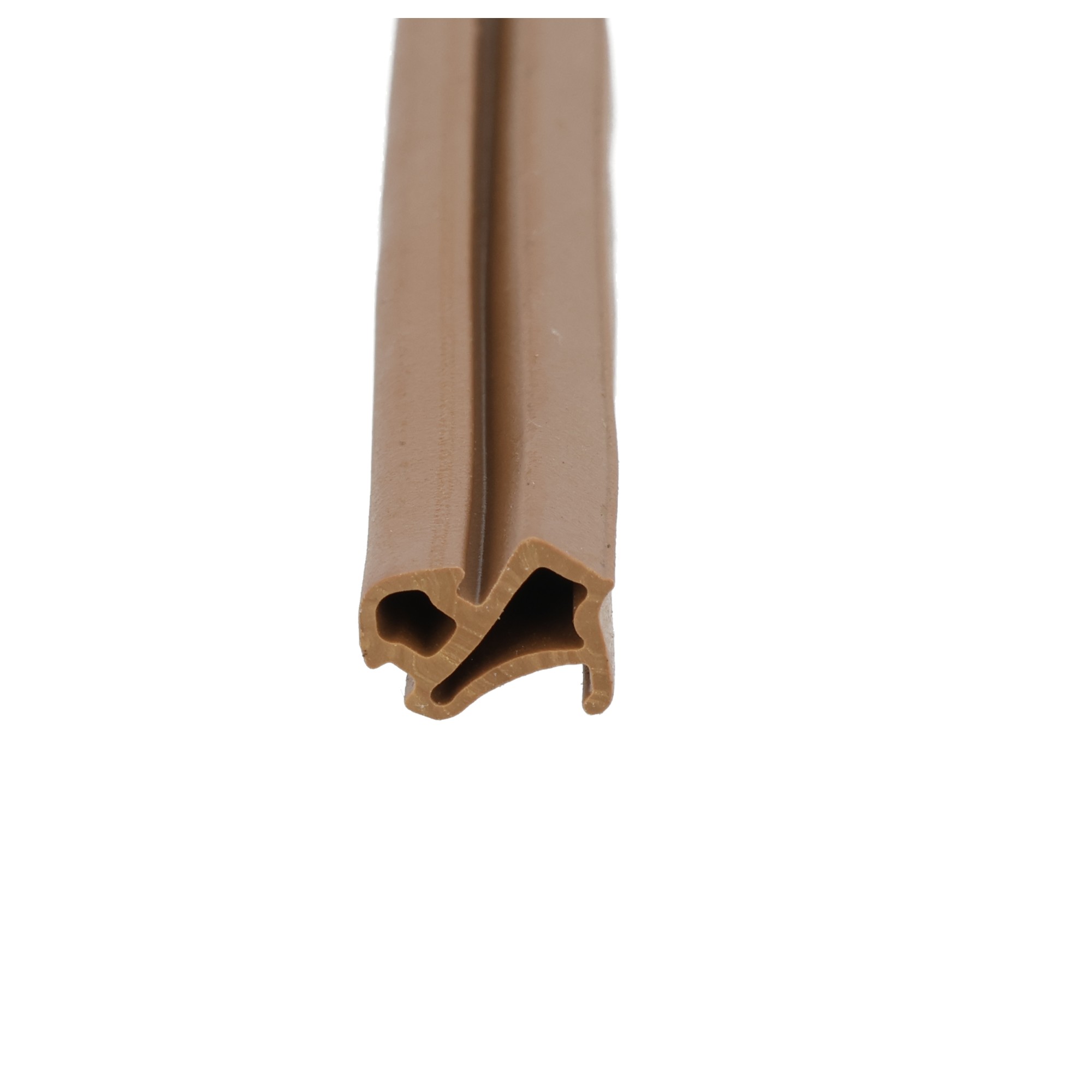 uszczelka-do-okien-epdm-pcv-s-1127-brazowa-020702-6 - Centrum uszczelek Close-up of a brown plastic object with a vertical, curved form and hollow cutouts at its bottom edge.