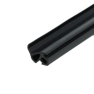 Close-up of a black metal component with a rounded, hollow edge, oriented diagonally against a white background.