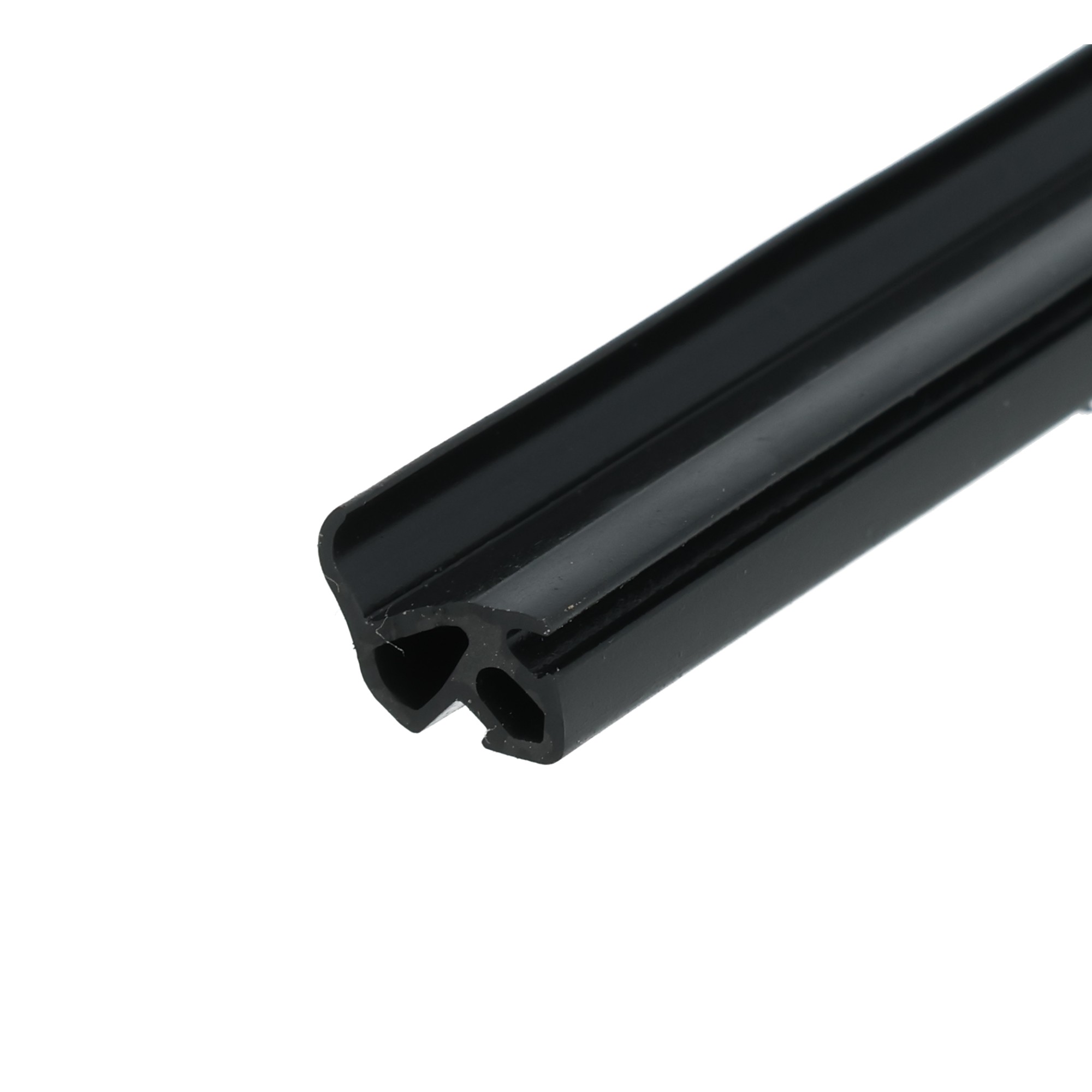 uszczelka-do-okien-pcv-czarna-s-1559-12-809-4 - Centrum uszczelek Close-up of a black metal component with a rounded, hollow edge, oriented diagonally against a white background.