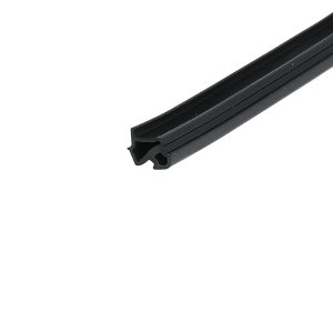 Close-up of a black plastic U-channel extrusion with a hollow center and flanged edges, diagonal across the frame.