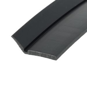 Close-up of a dark gray metal rail with a beveled edge along a diagonal.