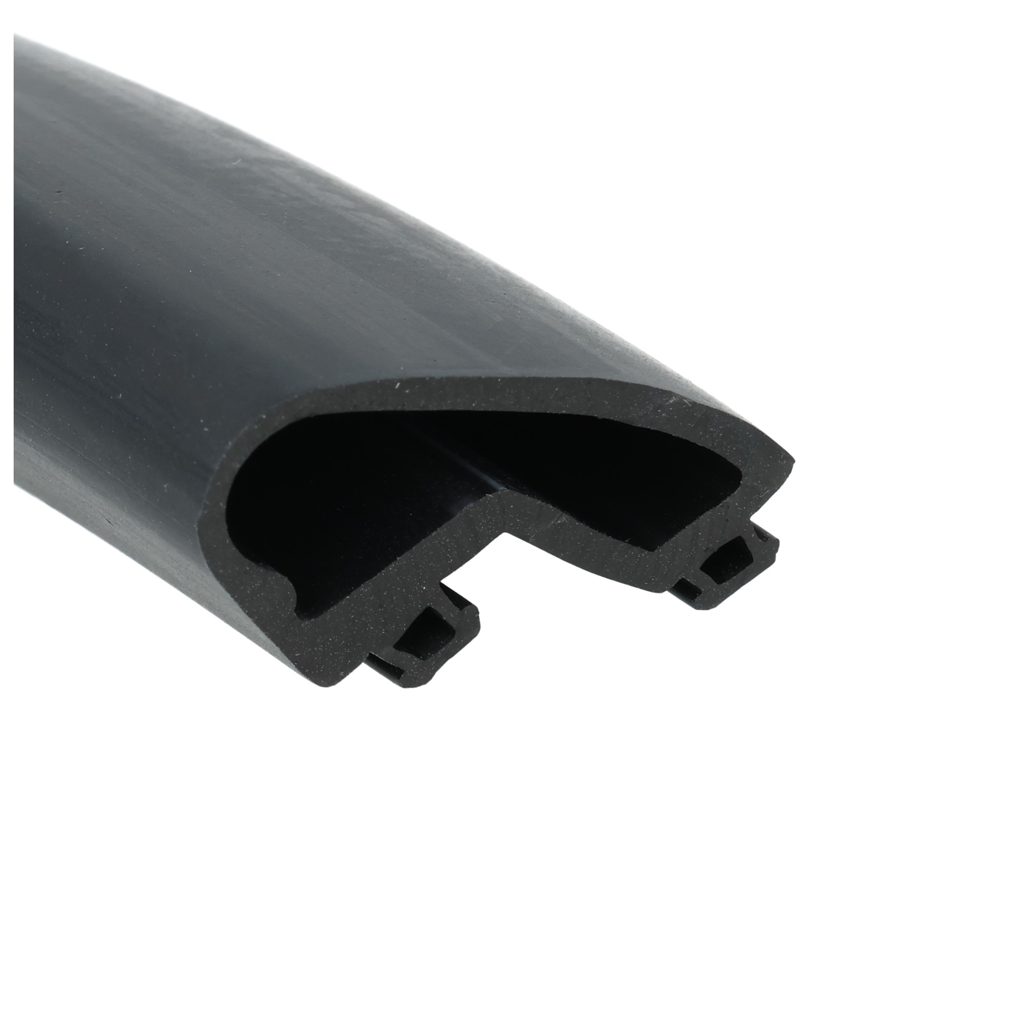 uszczelka-dolna-drzwi-roletowych-wsuwana-gumowa-15-x-25mm-czarna-21-205-5 - Centrum uszczelek Close-up of a black plastic cylindrical connector with rectangular slots at the end.