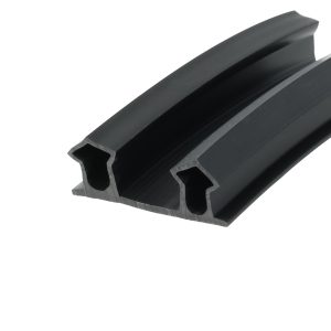 Close-up of a black metal U-shaped extrusion with internal slots forming a channel (rail cross-section)