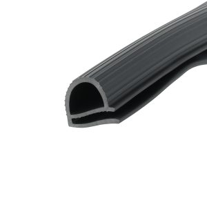 Close-up of a black rubber belt with multiple grooved ribs, curved into a coil/roll.