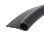 Close-up of a black metal tube with a circular hole at its end on a white background.