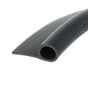 Close-up of a black metal tube with a circular hole at its end on a white background.