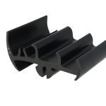 Black plastic multitier clip with several U-shaped slots, used to hold thin items like cables or rods in place.