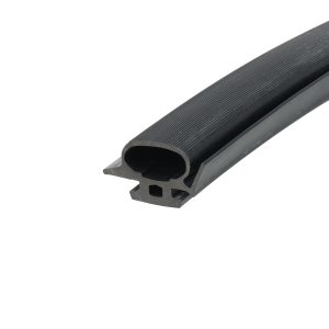 Close-up of a black rubber extrusion with a hollow center and ribbed outer surface.