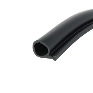 Close-up of a black cylindrical pipe with a hollow circular opening, showing a smooth surface and angled cut, diagonal in the frame.