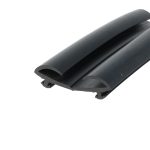 Close-up of a black cylindrical plastic tube with a curved groove, showing a hollow cross-section and smooth glossy surface