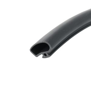 Close-up of a gray curved plastic tube end with a hollow interior against a white background