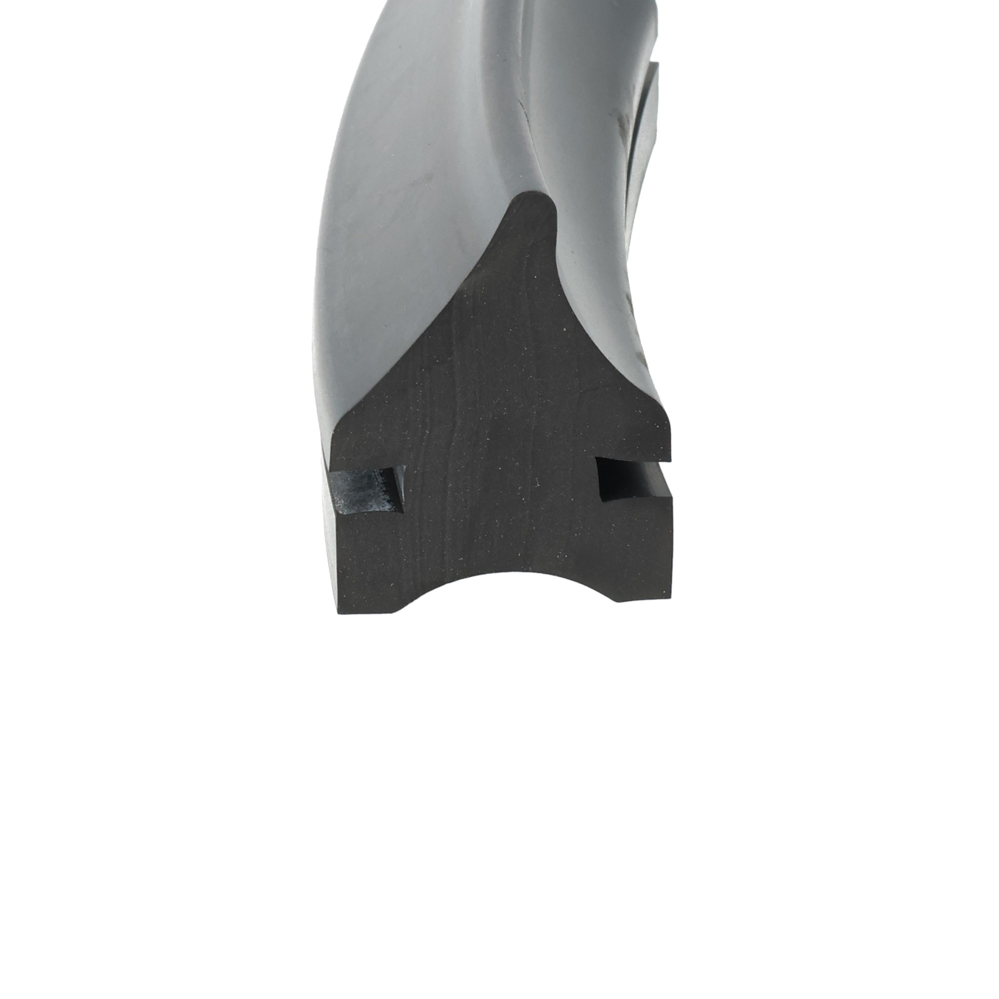 uszczelka-drzwi-naczepy-wywrotki-gumowa-lita-29-x-37mm-czarna-029300-3 - Centrum uszczelek Close-up of a metallic gray blade-like object with a dark base and curved surface.