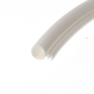 Close-up of a white cylindrical object with a rounded end diagonally across a white background.