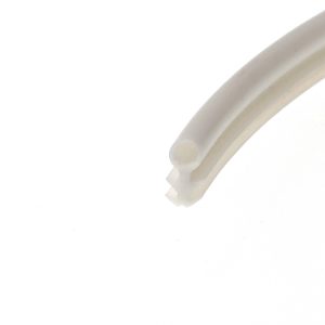 Close-up of three light beige plastic tubes with rounded ends arranged diagonally on a white background.