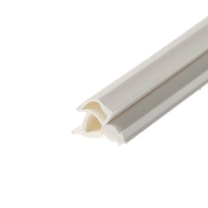 Close-up of white hollow plastic tubes or dowels with a beige inner core, arranged diagonally across a white background.