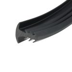 Close-up of a black curved plastic component with a serrated/teeth-edged edge, viewed at an angle.