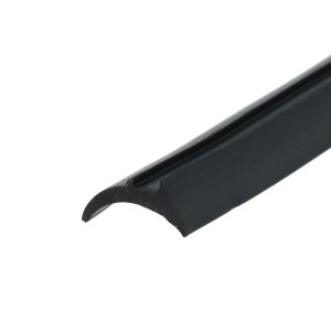 Close-up of a black plastic tool with a curved hook along the bottom edge against a white background.