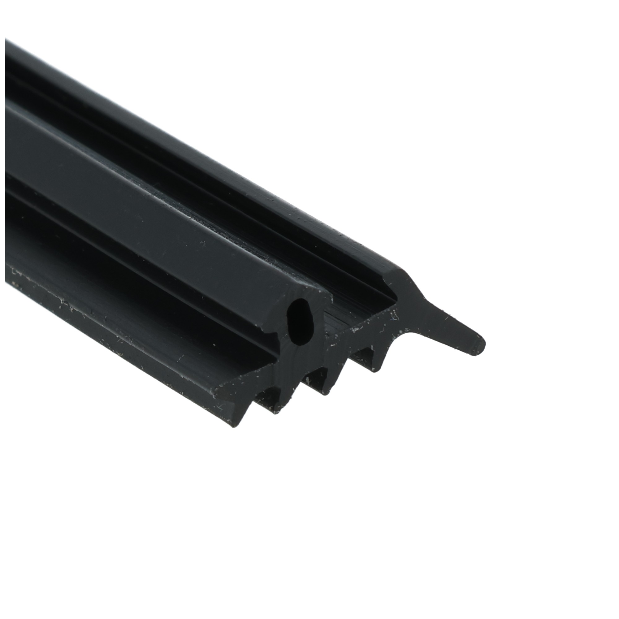 uszczelka-epdm-do-okien-pcv-s-1124-12-821-1 - Centrum uszczelek Close-up of a black plastic component with ridged edges and a circular hole, diagonal across the frame.