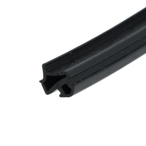 Close-up of a black grooved rail or extrusion set diagonally against a white background.