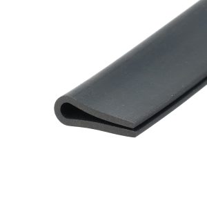 Close-up of a dark gray metal tube with a rounded hollow end, set diagonally against a white background.