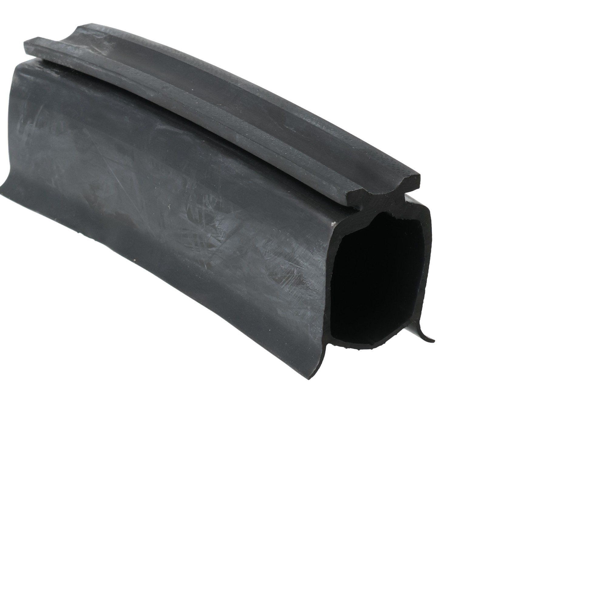 uszczelka-gumowa-dolna-bramy-garazowej-17-x-28-x-35mm-czarna-57-109-3 - Centrum uszczelek Black rubber extrusion with a hollow rectangular channel and a thin ridge along the top edge, shown in close-up