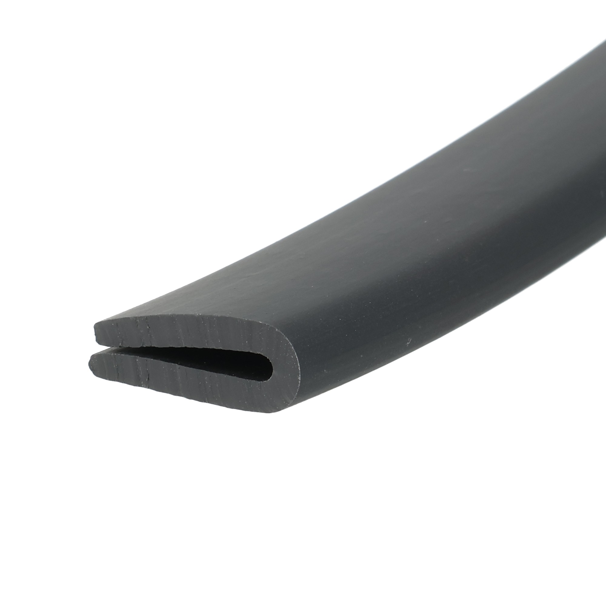uszczelka-krawedziowa-2mm-czarna-12-317-2 - Centrum uszczelek Close-up of a black curved plastic or rubber object with a large oval slot at the open end, set against a white background.