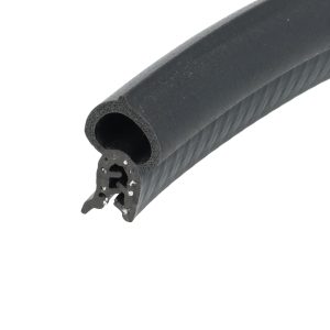 Close-up of a black foam cylindrical tube with a hollow center and porous cut end (foam seal).