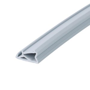 Close-up of a gray plastic channel extrusion with a U-shaped hollow cross-section, diagonally oriented in the frame.] ,
