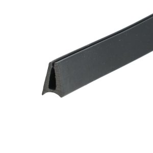 Close-up of a black metal channel with a U-shaped cross-section running diagonally against a white background.