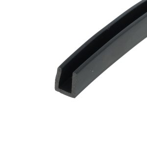 Close-up of a black U-shaped metal channel photographed diagonally on a white background with a slightly textured edge.