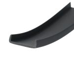 Close-up of a black curved edge with a squared, beveled tip against a white background, showing a matte surface and slight wear.