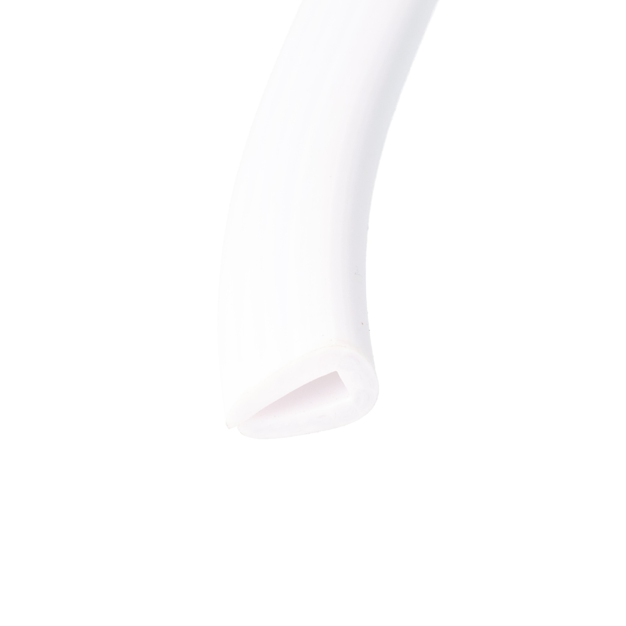 uszczelka-krawedziowa-miekkie-pvc-3-x-6-x-12mm-biala-12-311-02-3 - Centrum uszczelek Close-up of a smooth white curved object resembling a mannequin leg or sculpture, with a small pinkish tag near the bottom edge