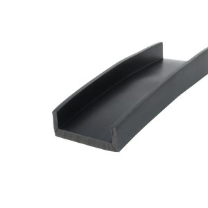 Close-up of a black metal U-channel profile with flanges photographed at an angle.