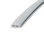 Close-up of a light-gray plastic channel/trim with a hollow inner groove, shown diagonally across the image.