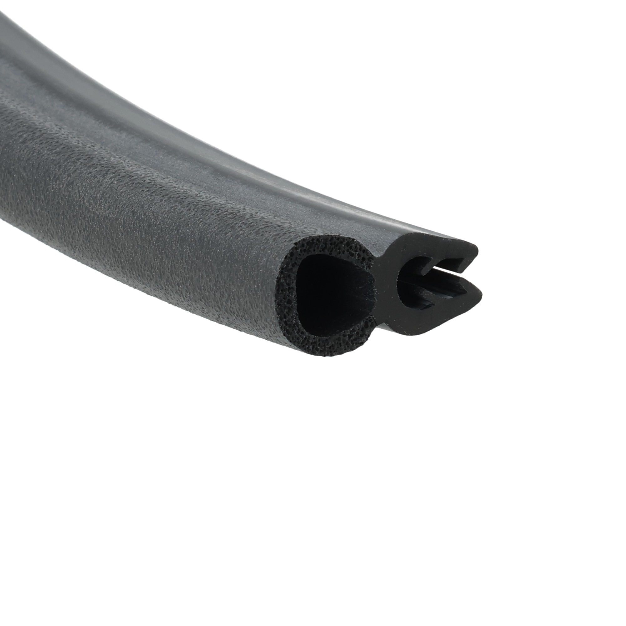 uszczelka-krawedziowa-samozaciskowa-niezbrojona-25-35-x-9-x-22mm-czarna-39-597-1 - Centrum uszczelek Close-up of a black textured foam handle grip with a hollow interior opening