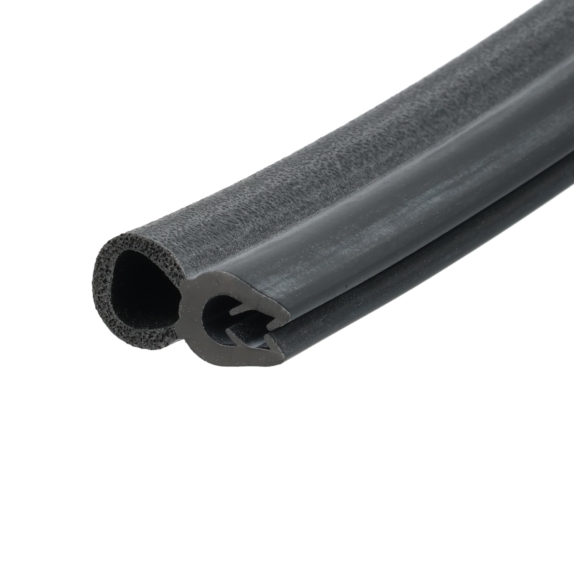 uszczelka-krawedziowa-samozaciskowa-niezbrojona-25-35-x-9-x-22mm-czarna-39-597-3 - Centrum uszczelek Close-up of a black foam-tube gasket with a hollow center and porous interior, showing its circular cross-section.