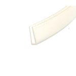 Close-up of a pale binder or notebook edge with evenly spaced holes along the spine, seen at a diagonal angle