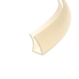 Close-up of beige curved ribbons or parchment-like strips against a white background, abstract composition.